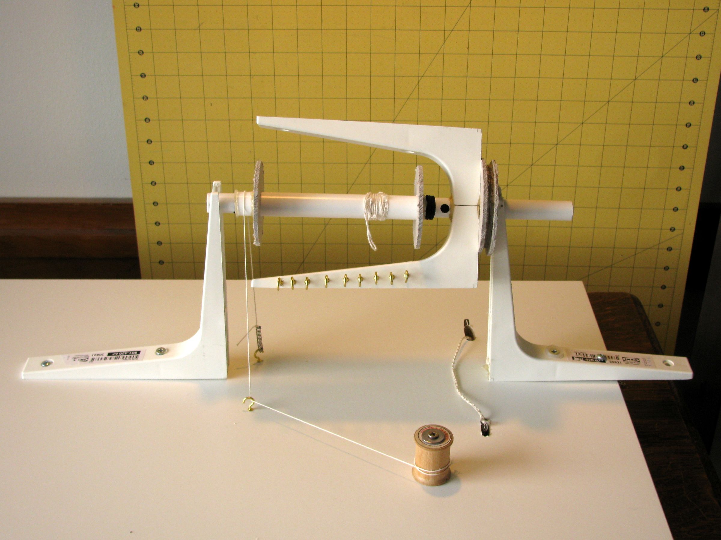 Spinning Attachment for a Treadle Sewing Cabinet