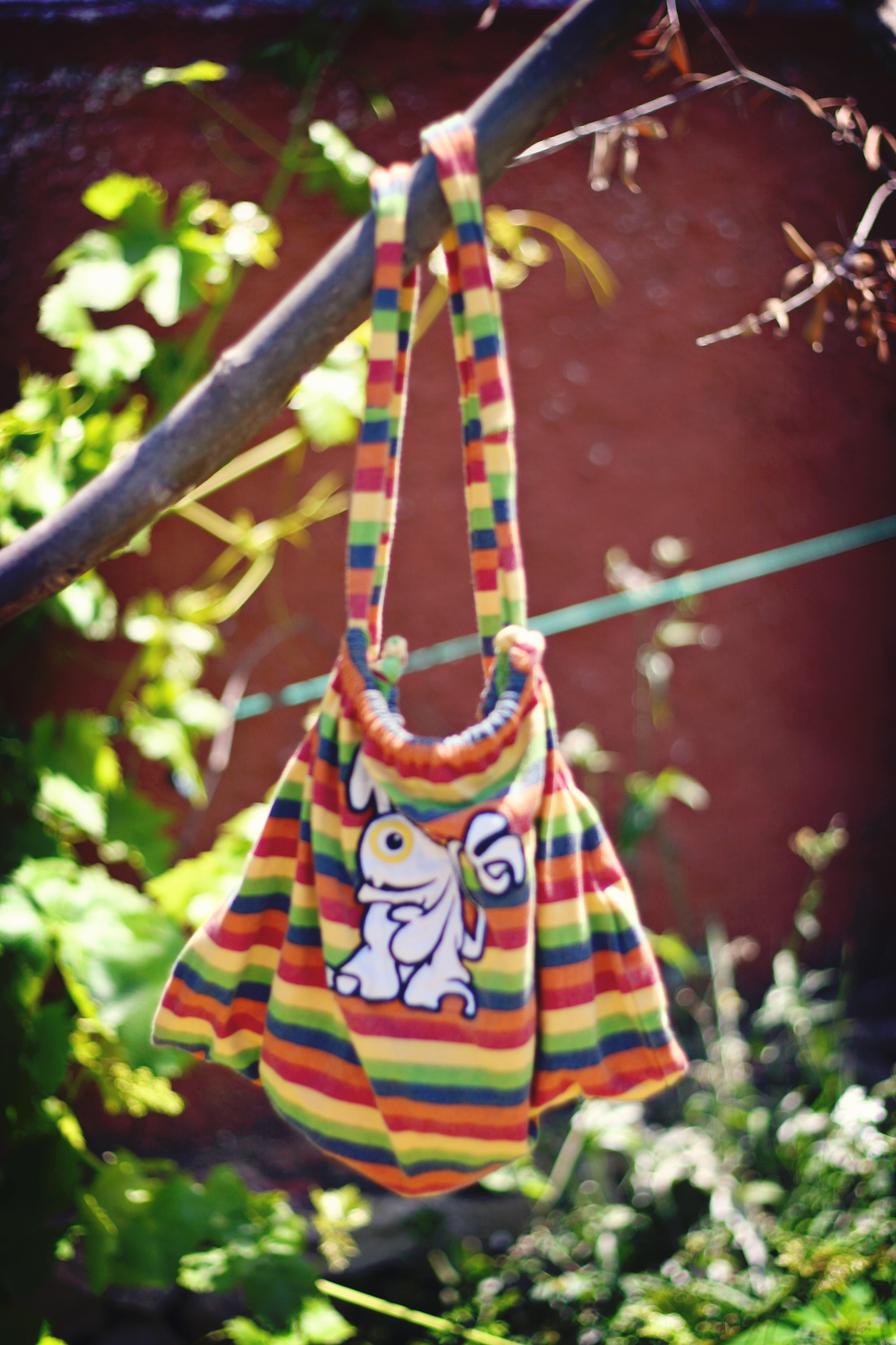 How to Convert a Kid's T-Shirt Into a Backpack