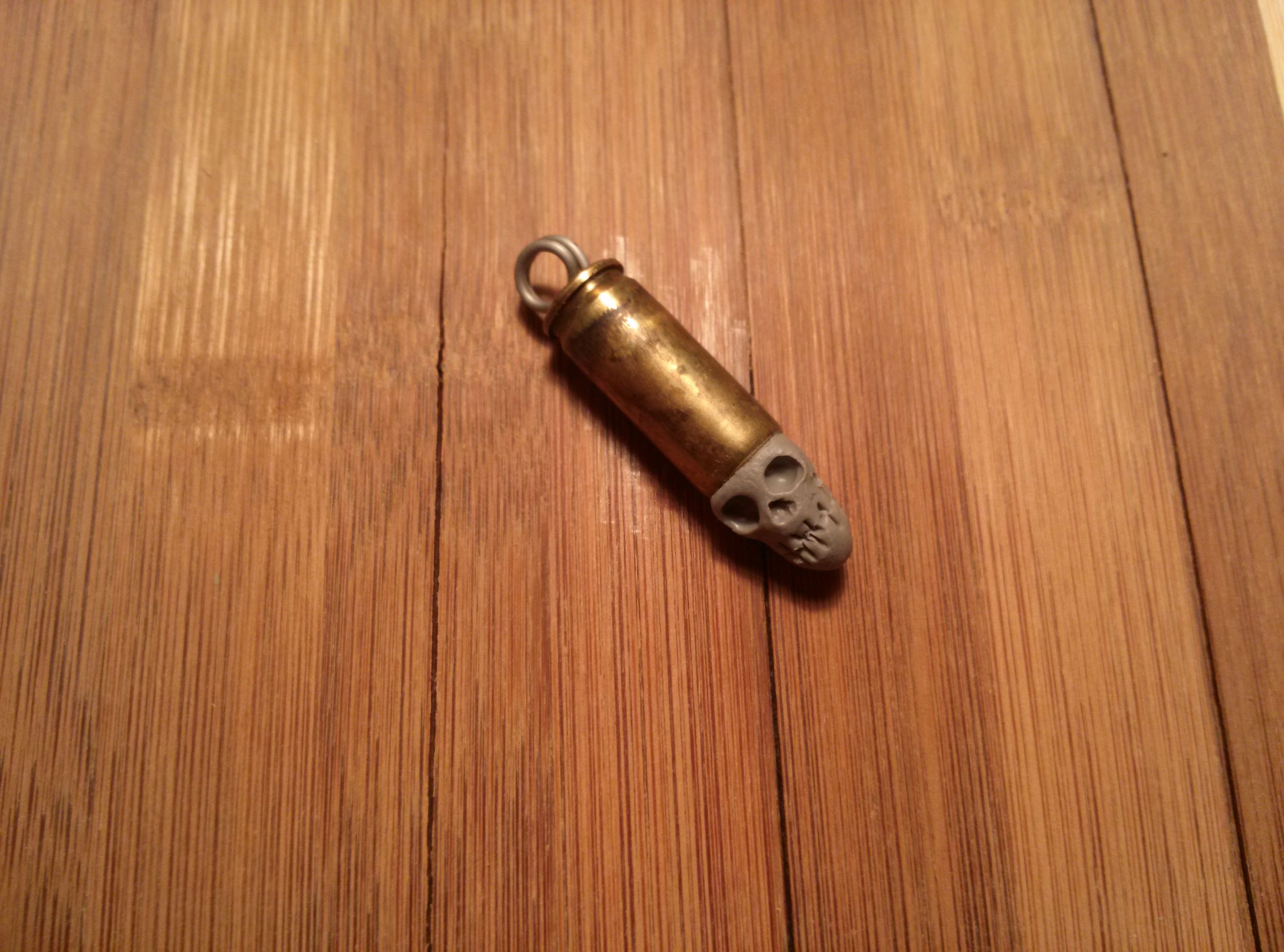 Brass Bullet Polymer Skull Pendant