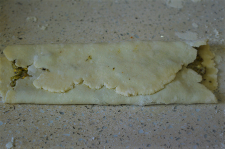 Then Bring Down the Top 1/3 Part of the Rolled Out Dough Down.