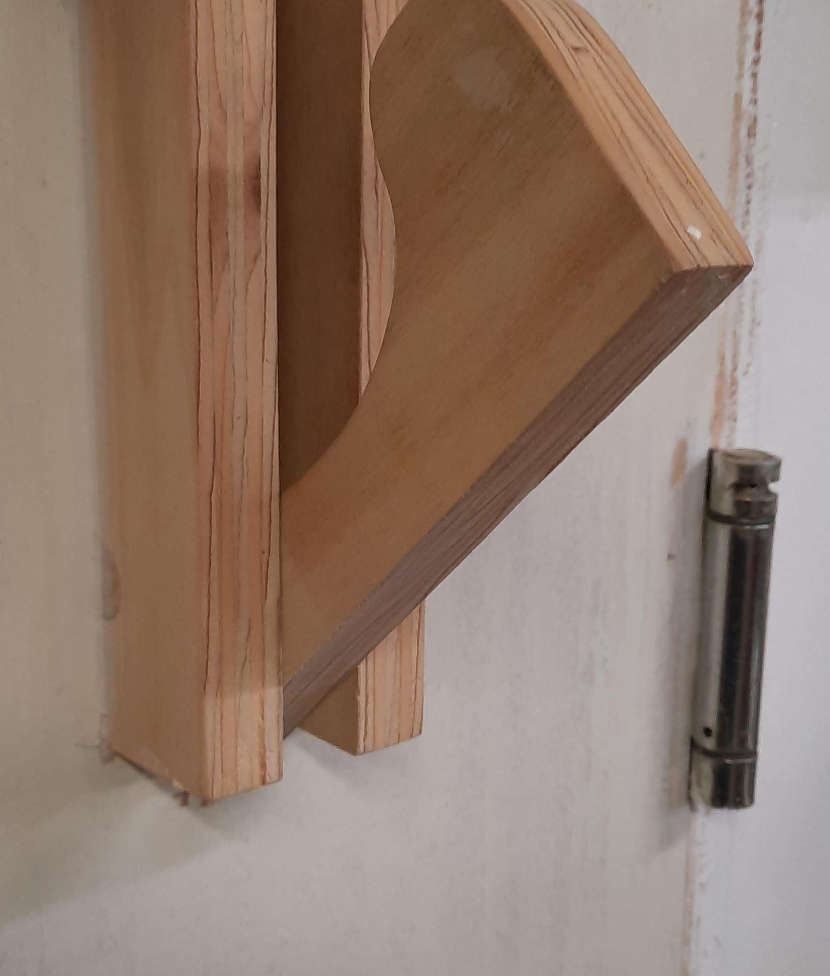 Fold Down Hanger for Coats, Cords, Etc.