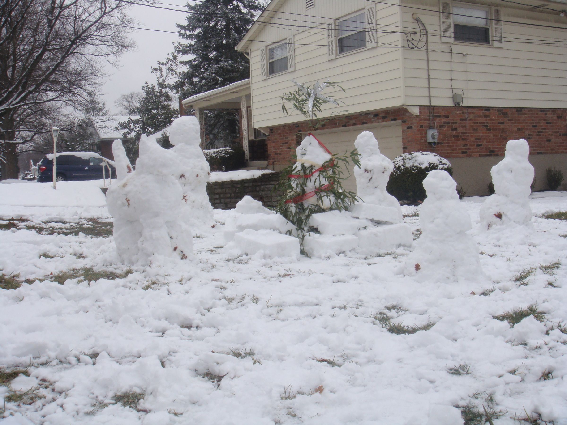 Snow Family with dog, Christmas Tree, and presents