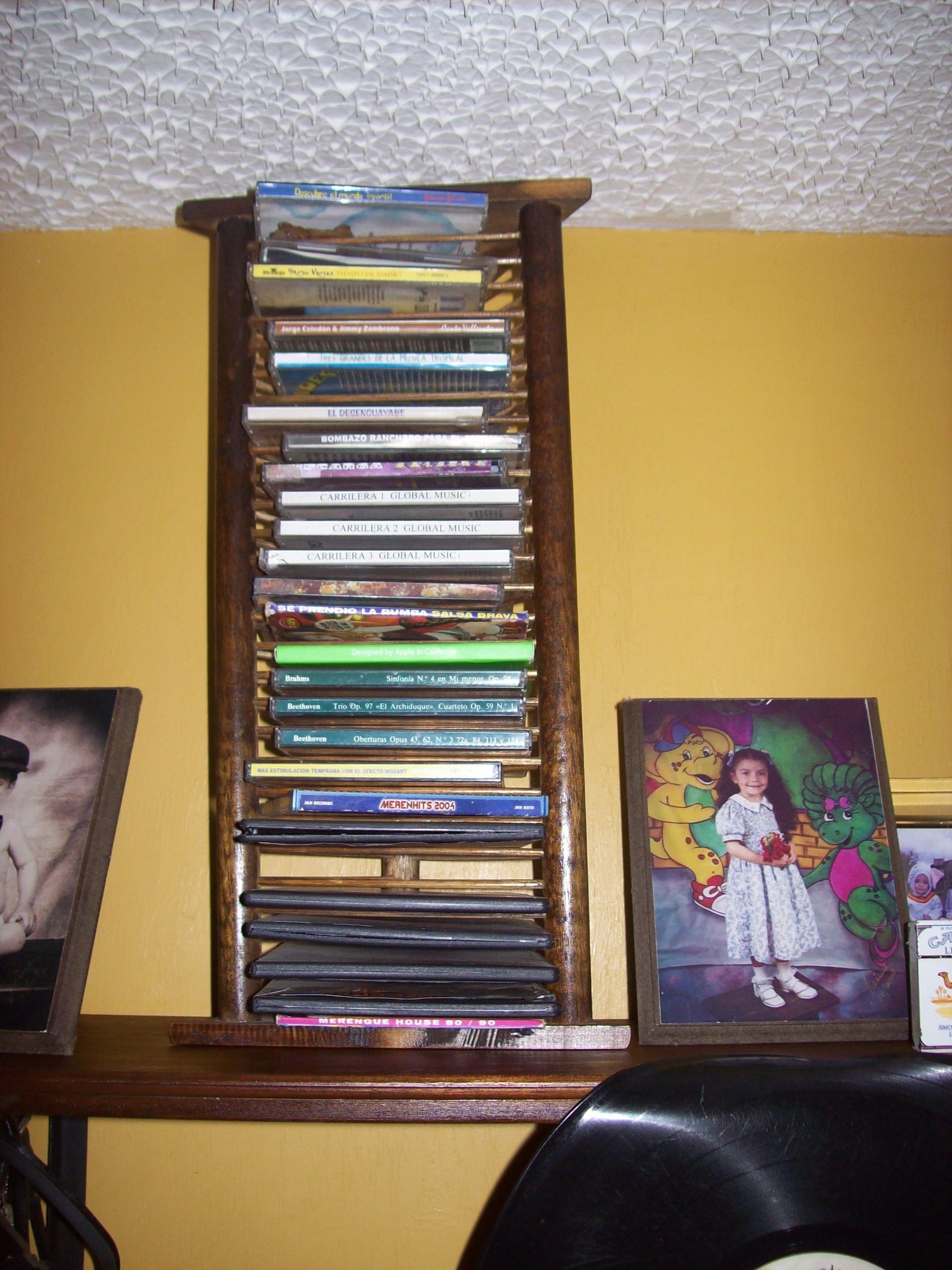 BROOM STICK CDS STAND. 4 Steps Instructables