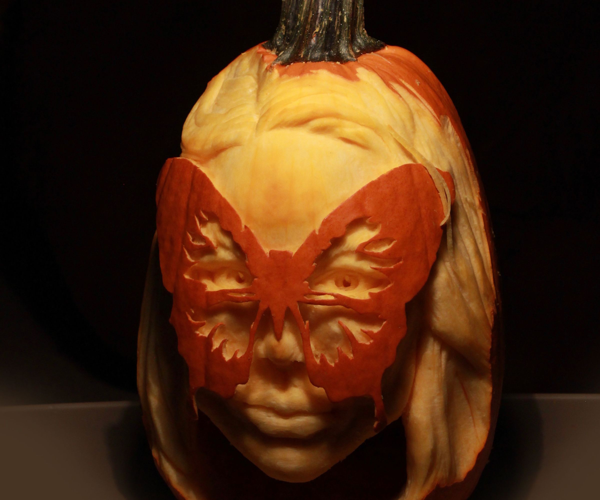 Carving a Butterfly Masquerade Pumpkin