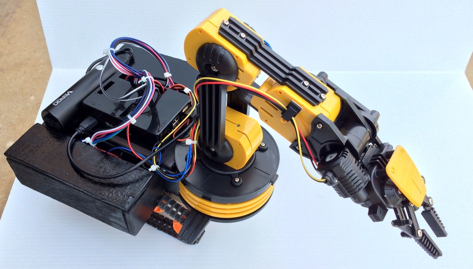 Make OWI Robotic Arm Self Propelled on Tracks Controlled Wirelessly by