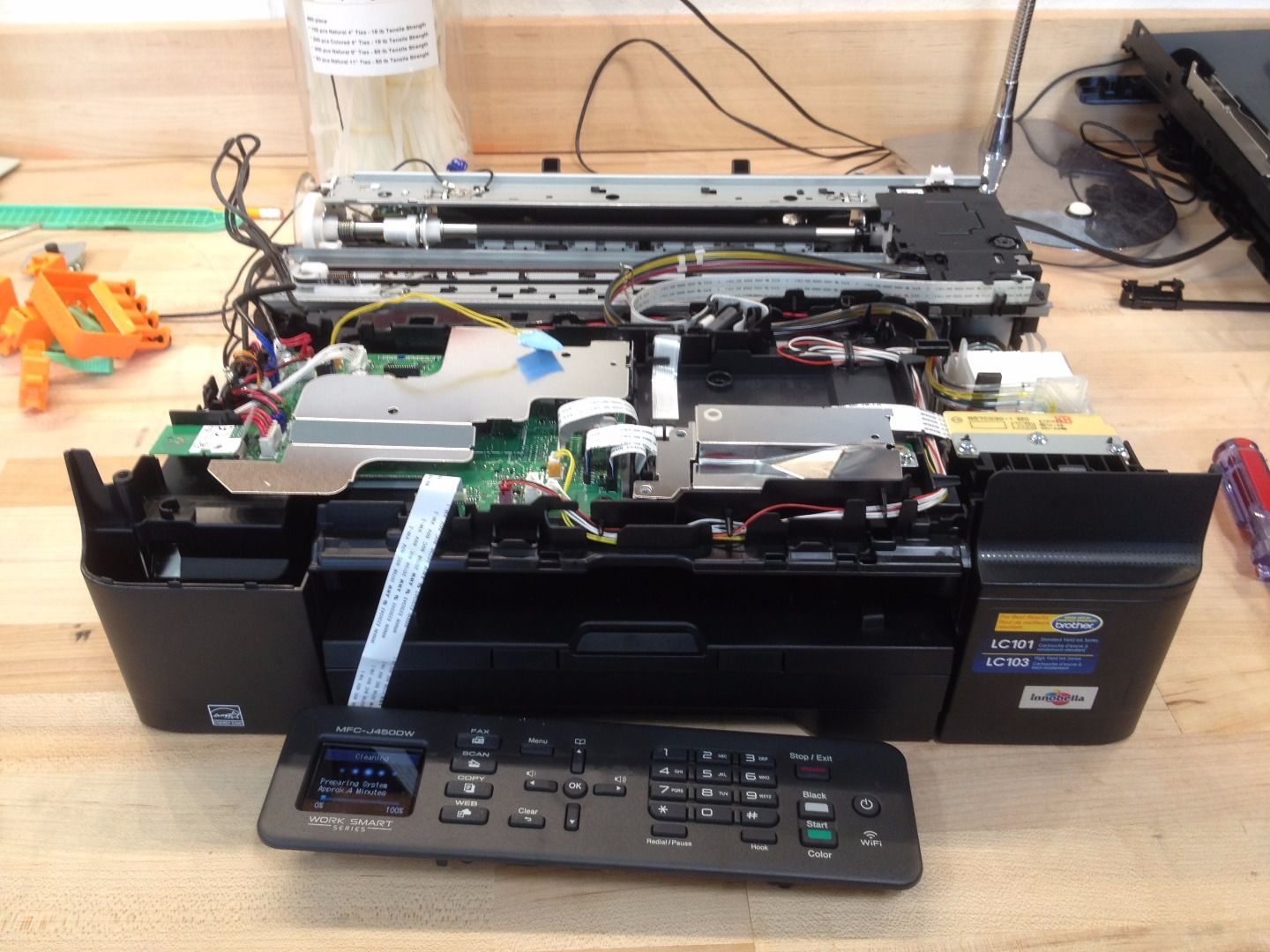 Disassembling a Brother MFCJ450DW Printer 31 Steps Instructables