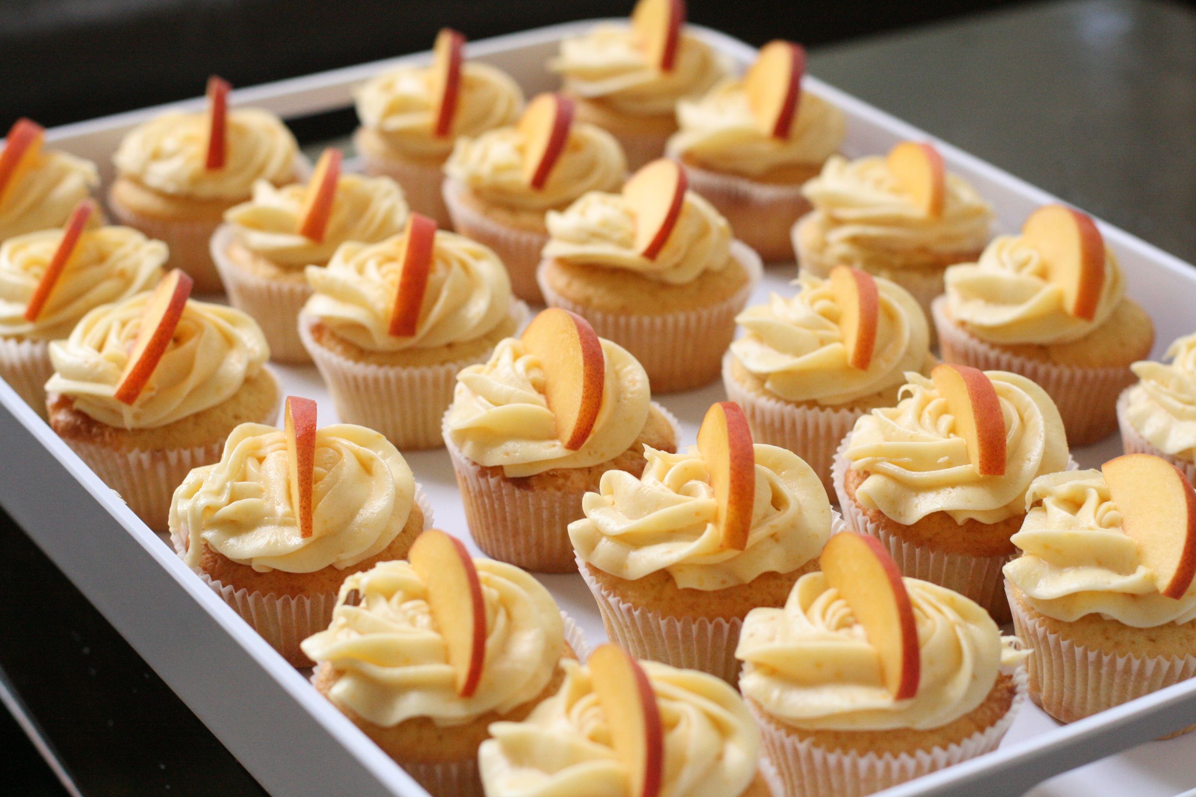 Peach Cupcakes With Peach Cream Cheese Frosting