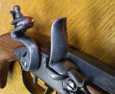 Convert a Toy Flintlock Pistol to Fire Caps