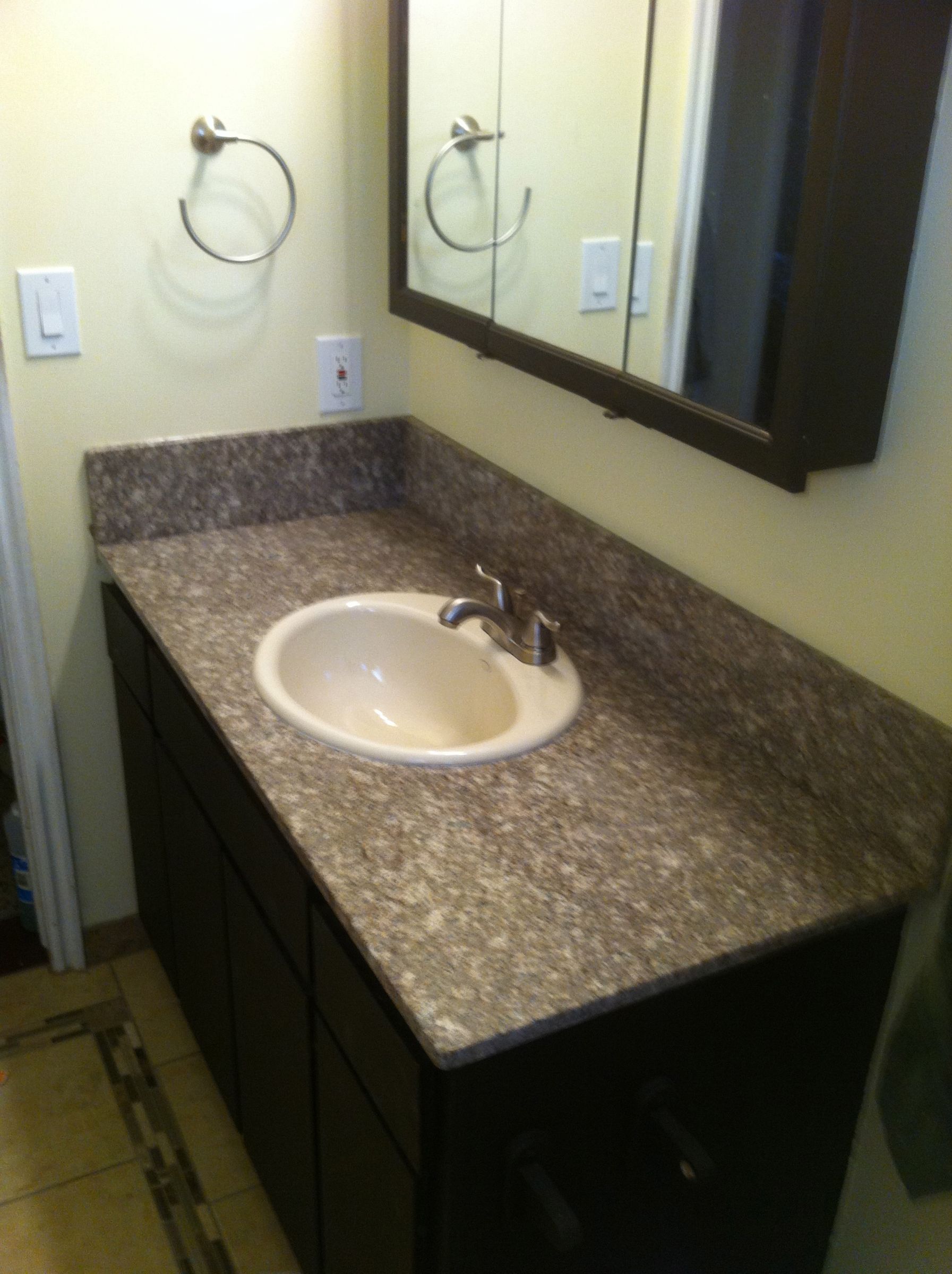 Hack an Inexpensive Granite Table Into a Bathroom Vanity