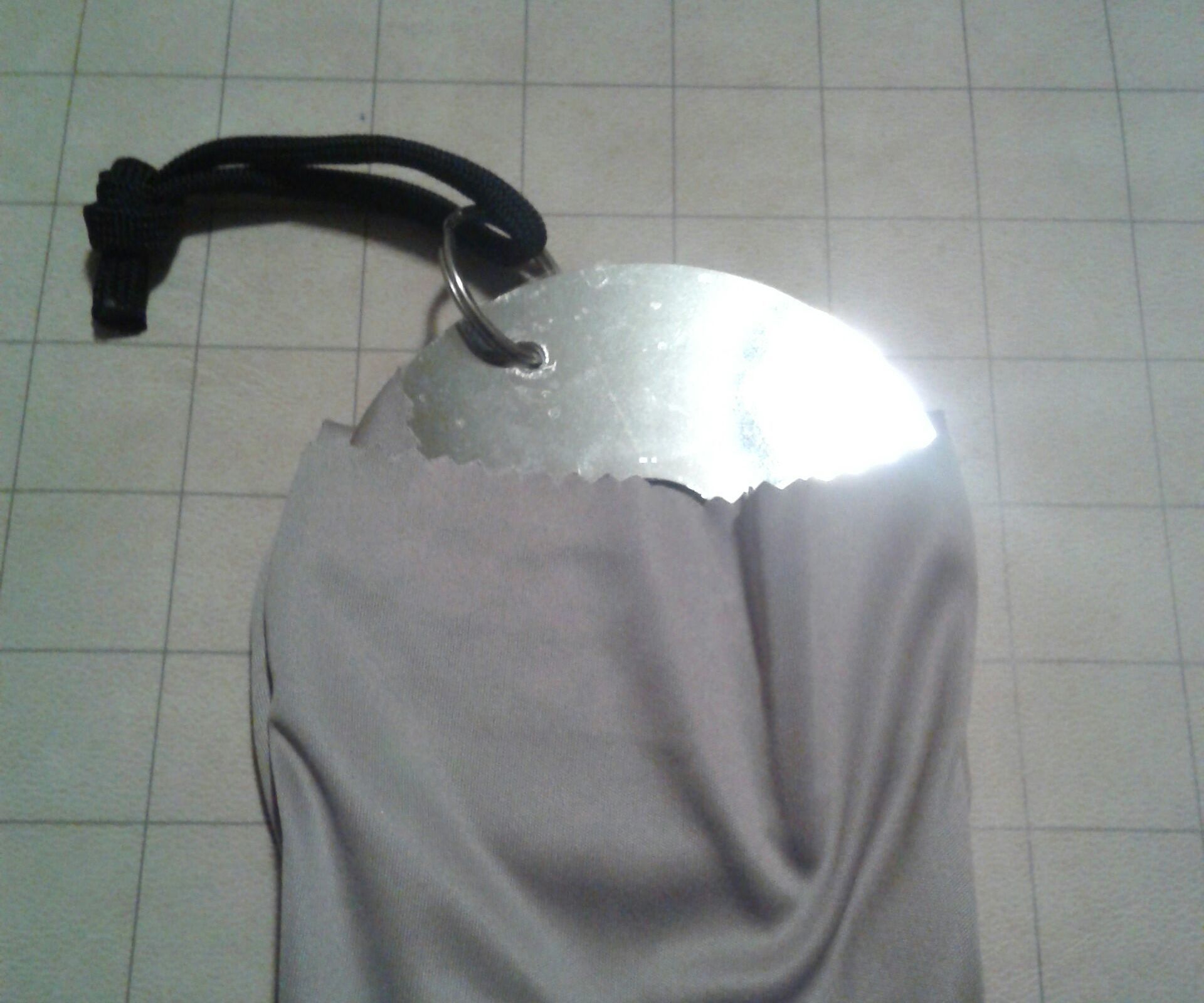 Signal Mirror Made From a Hard Drive Platter