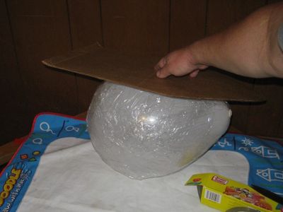 Build Up the Shape of the Shark Around the Balloon Using Cardboard
