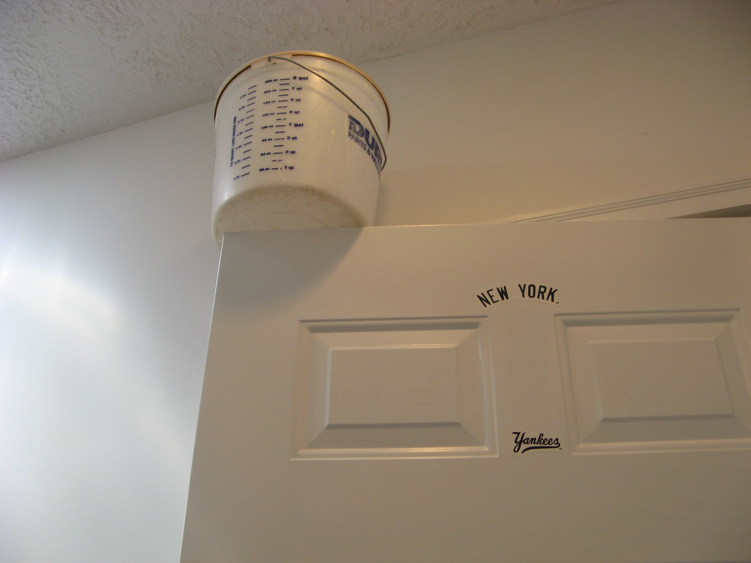 Classic april fools prank: bucket o' water trap