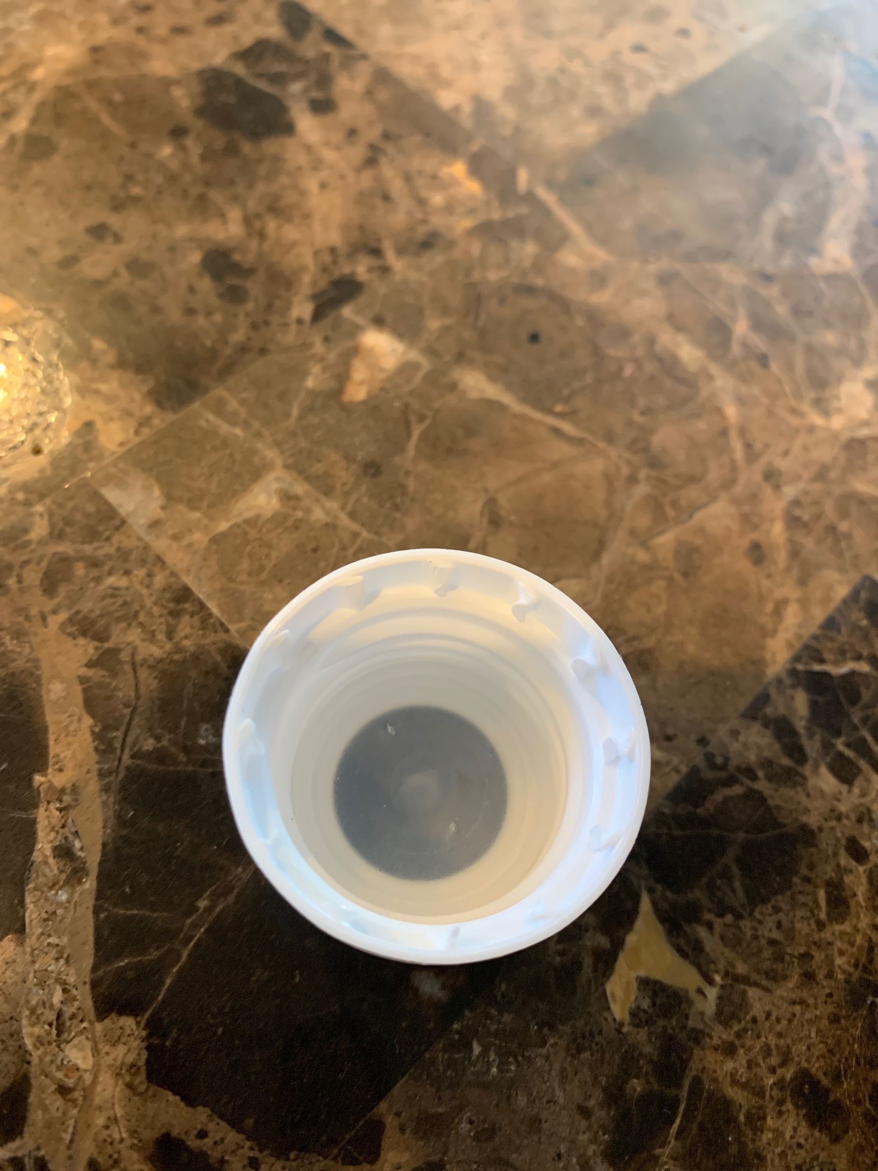 How to Remove the Cap on a Swiffer WetJet Cleaner Bottle. 3 Steps