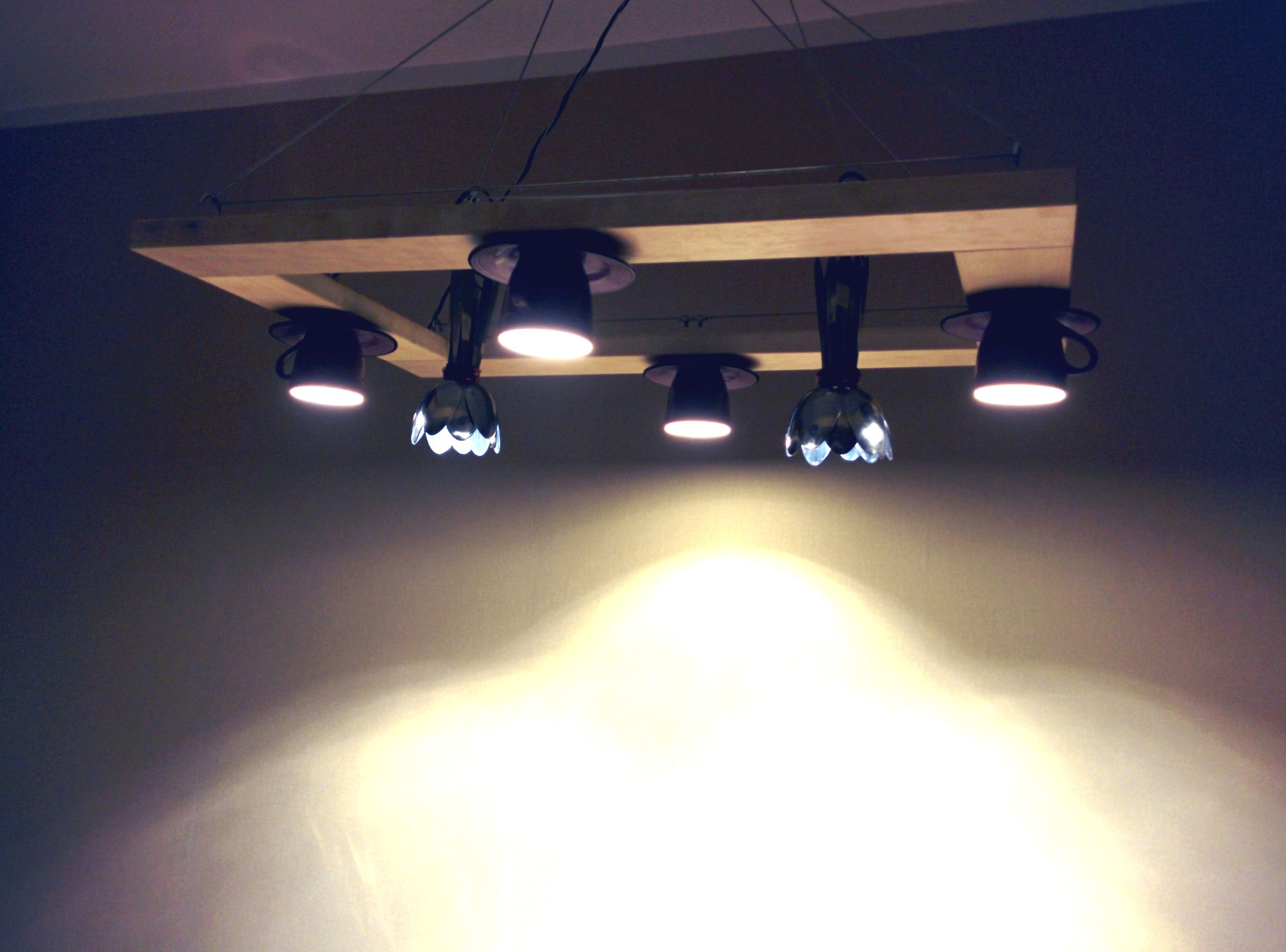 Kitchen Chandelier. Coffee Cups and Silverware.