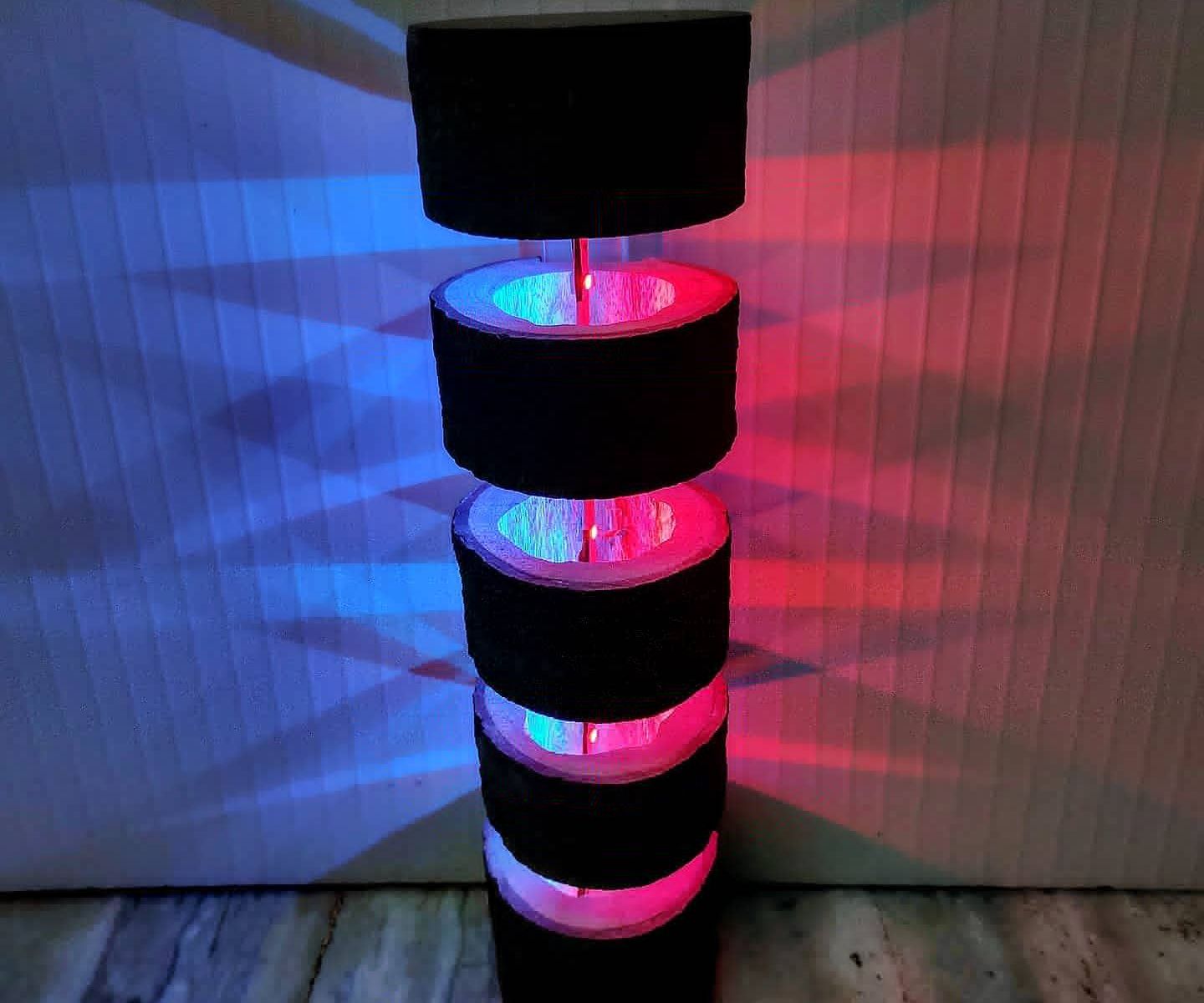 DUAL-TONE FLOATING WOOD LAMP.