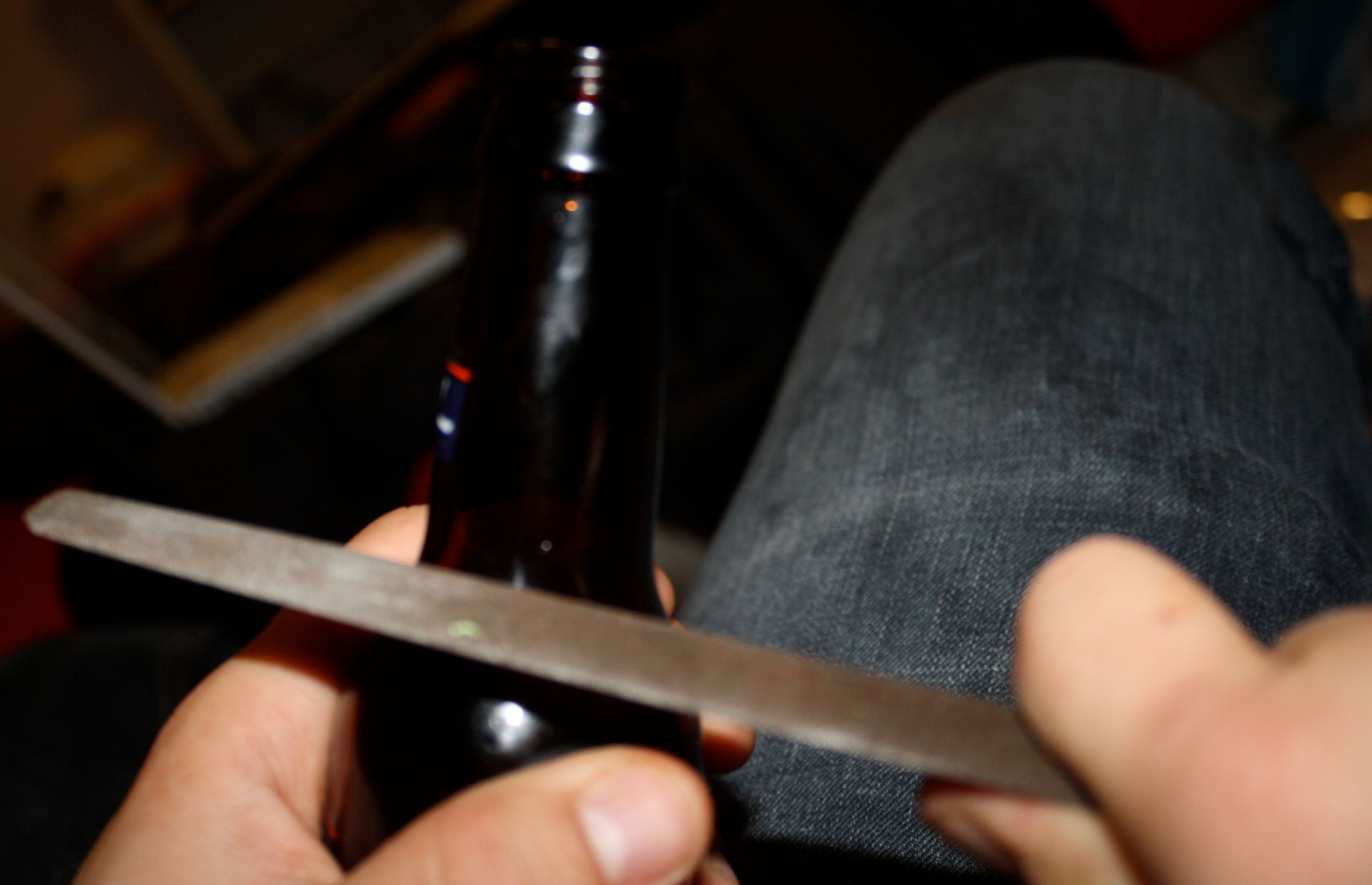 Glass Guitar Slide Using a Beer Bottle and a Rudimentary Tool. 5