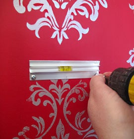 Measure and Attach Flush Mount Bracket to the Wood Board Through the Canvas
