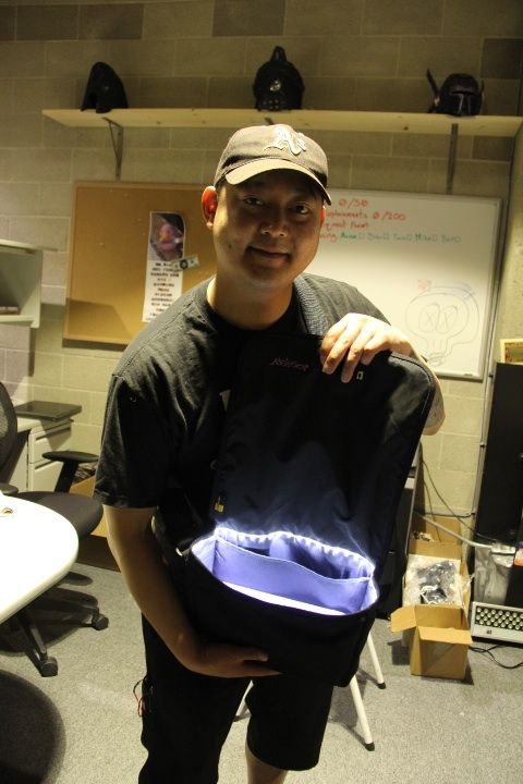 LED Lit Messenger Bag With Magnetic Switch