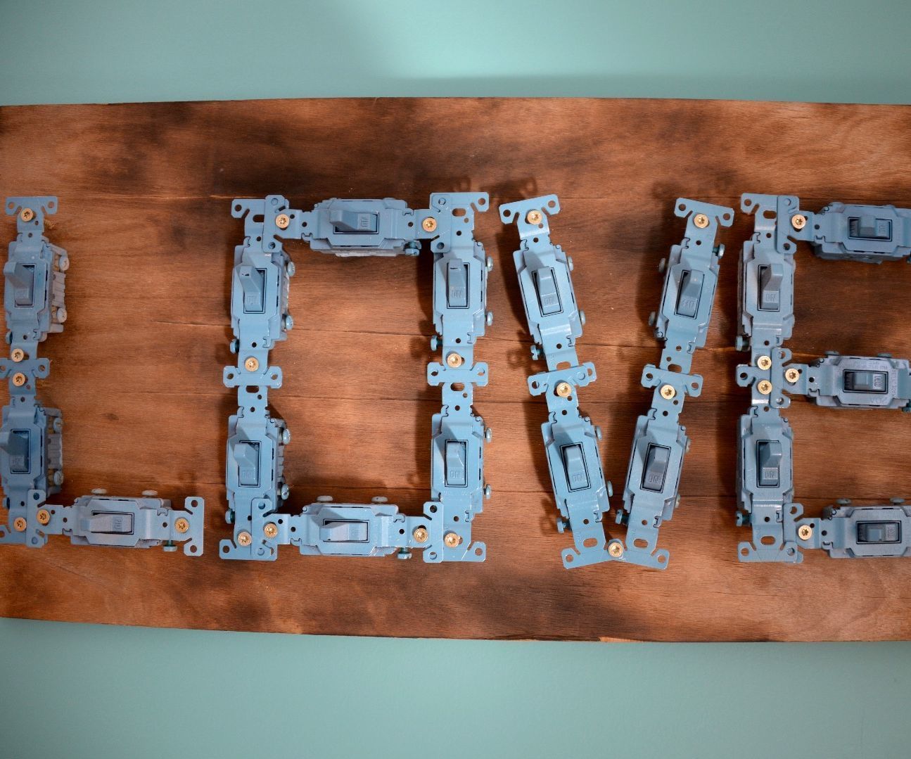 Let’s Make Love Art. I Made Light Switch Wall Art With DIY Distressed Wood Backer.