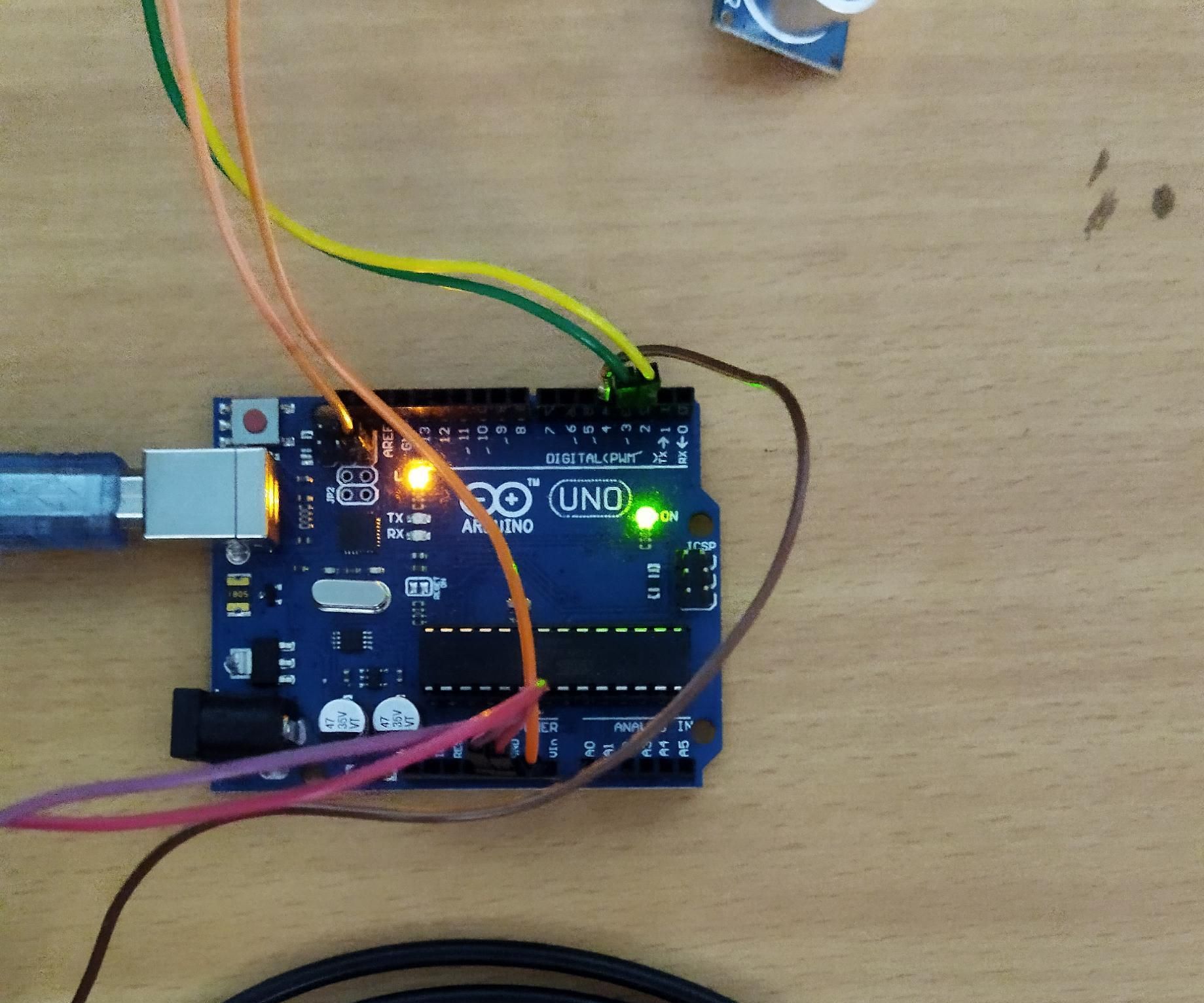 Arduino With Ultrasonic Sensor and Temperature Sensor