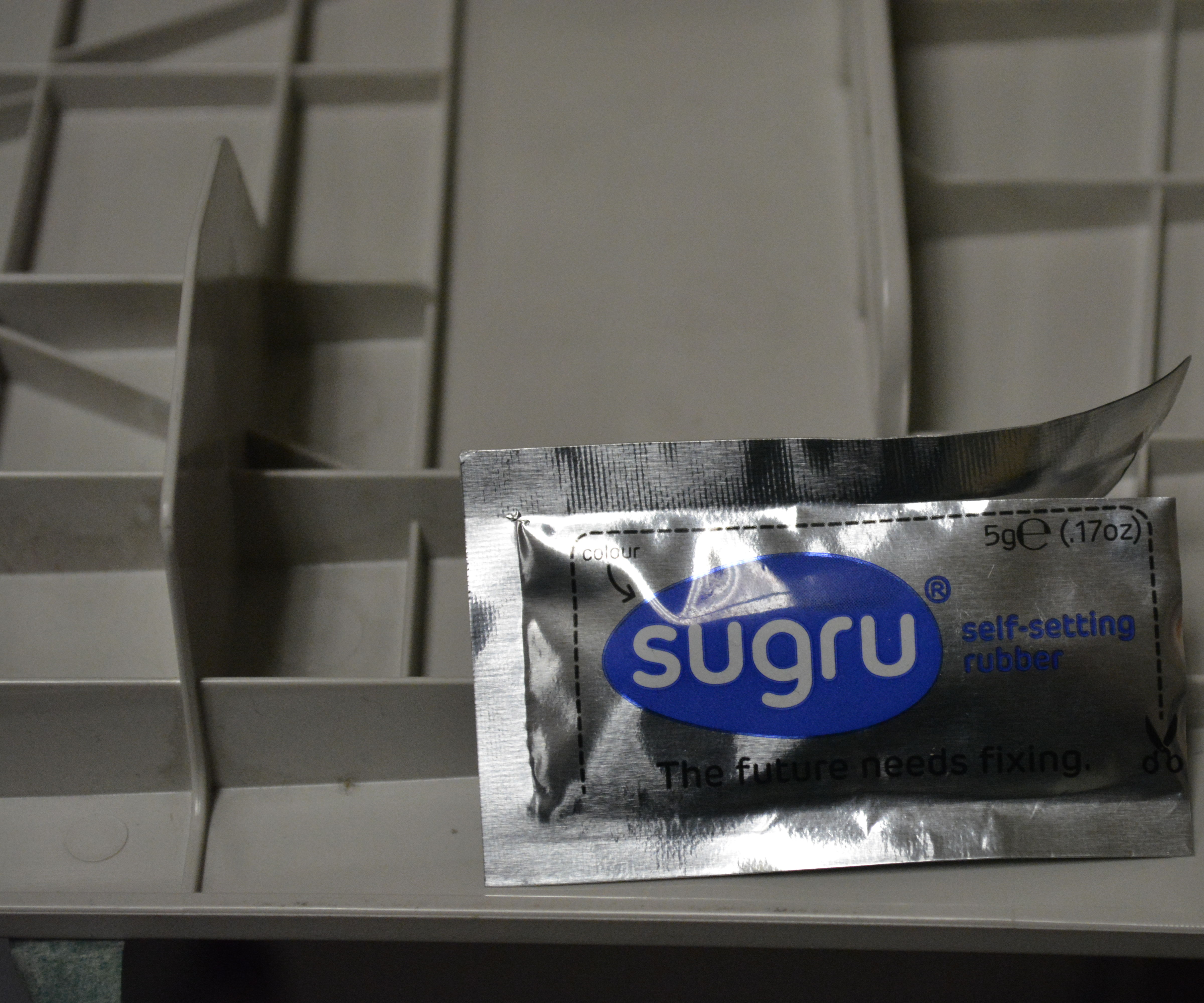 Sugru printer door fix