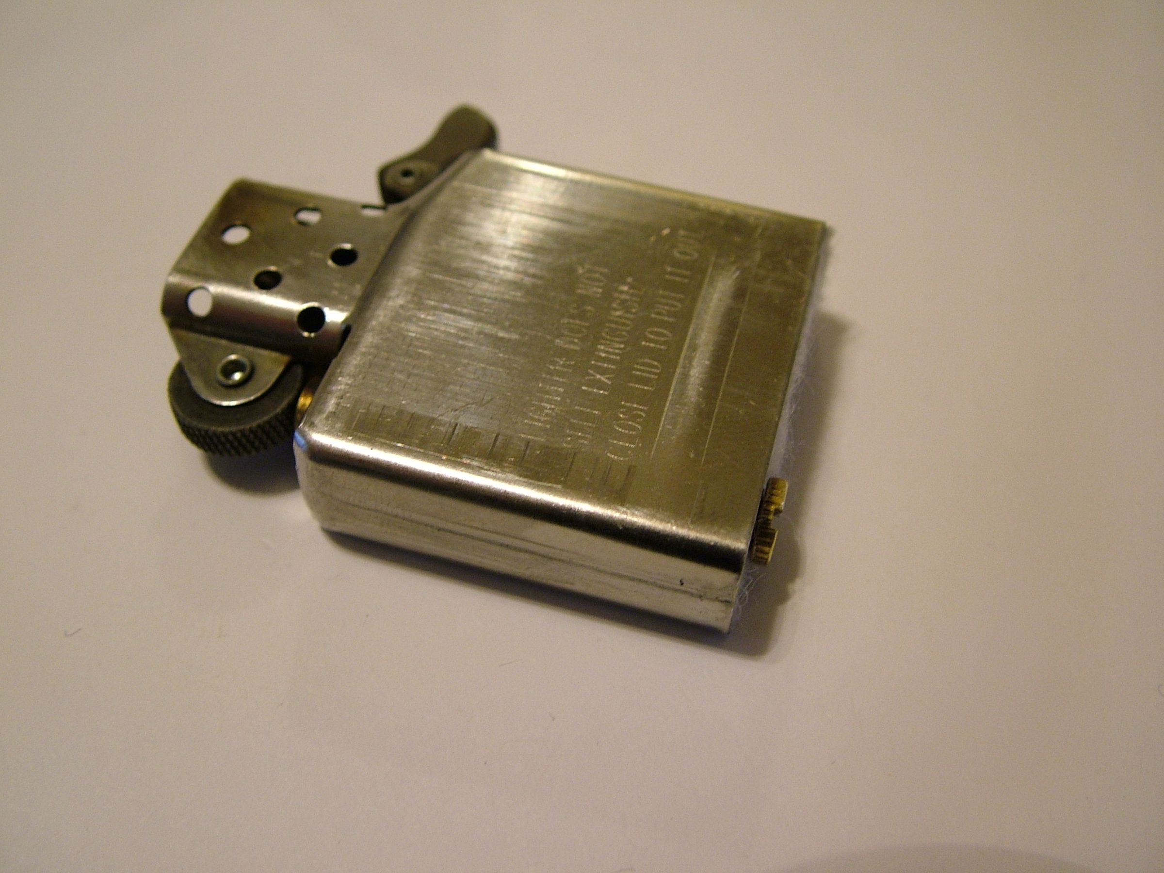 Replace Your Zippo Flint With Flint From a Dead BIC 4 Steps Instructables