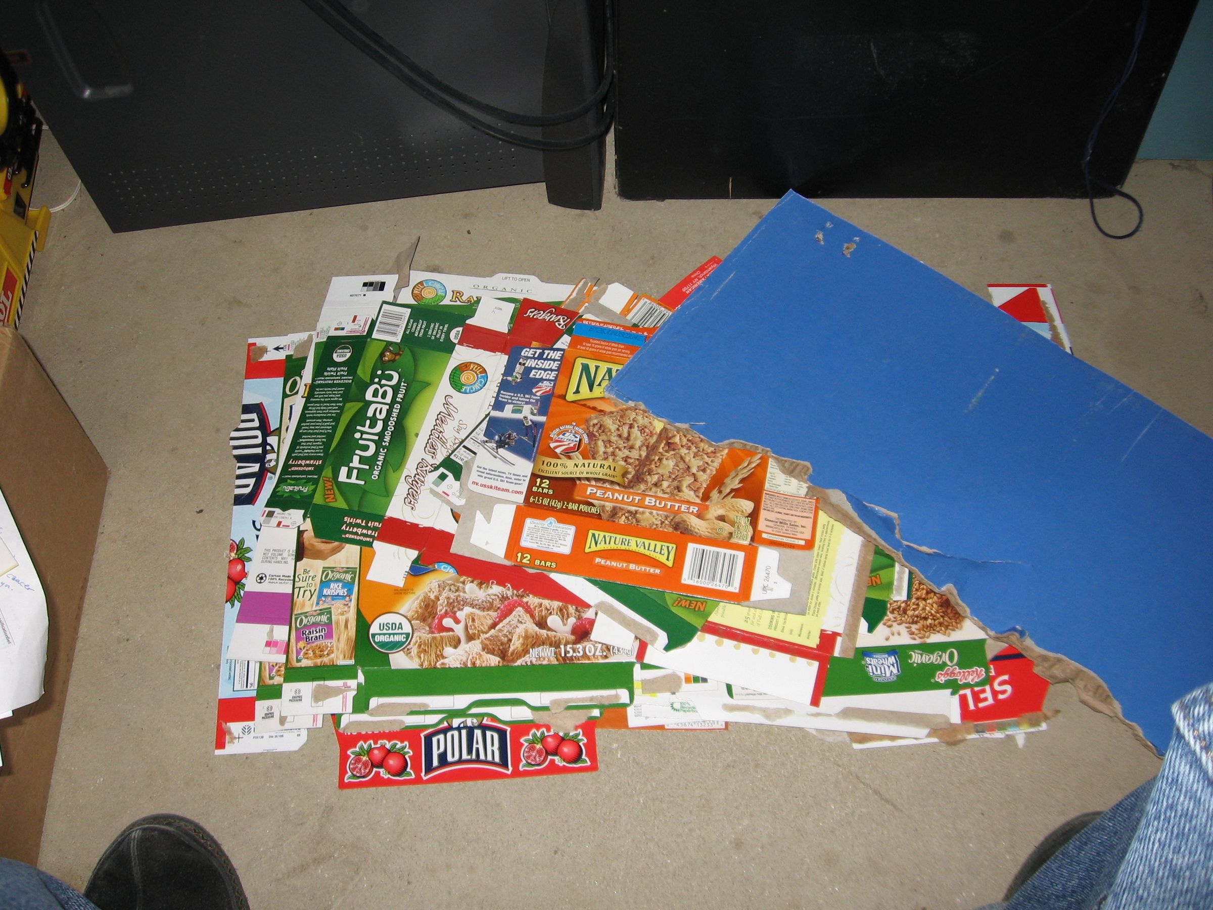 create a GINORMOUS mosaic (visible from space?) using scrap cardboard packaging