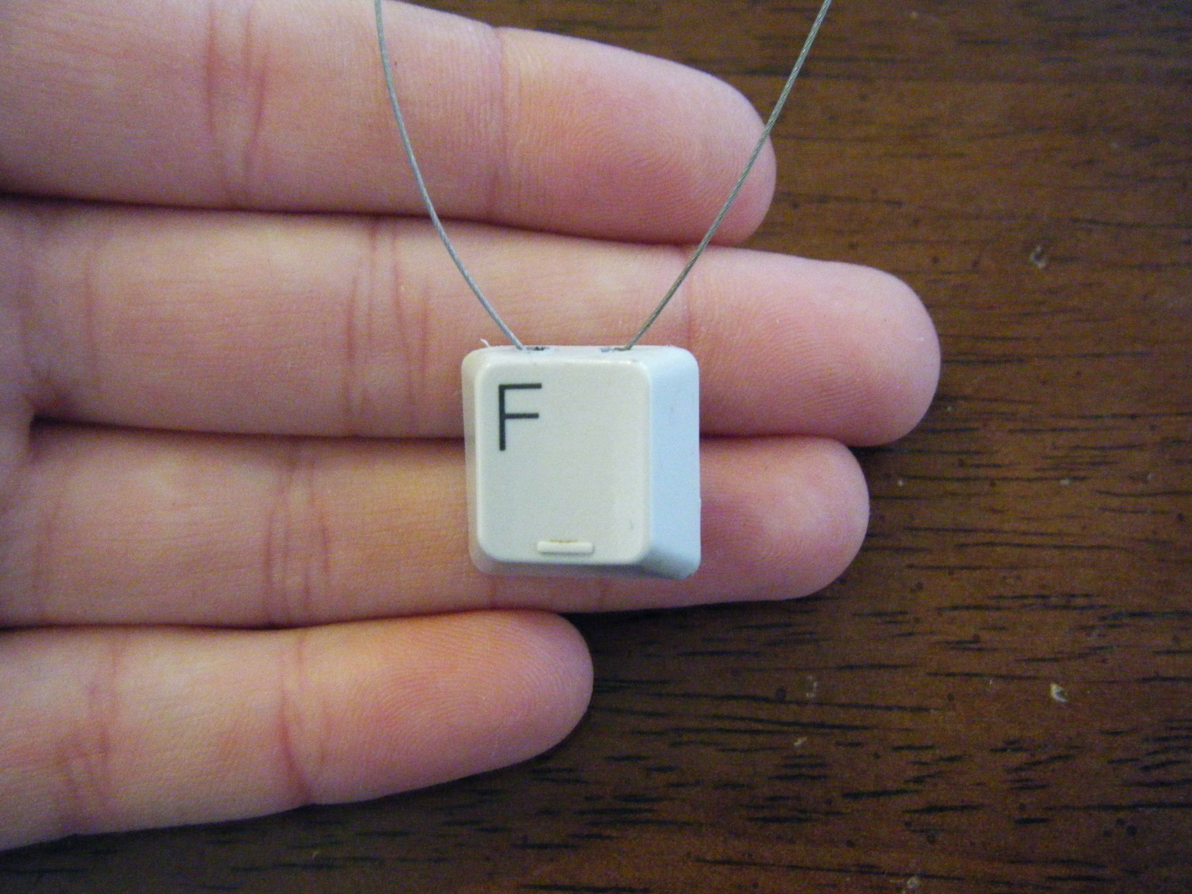 Xkcdian SkiFree 'F' Key Pendant