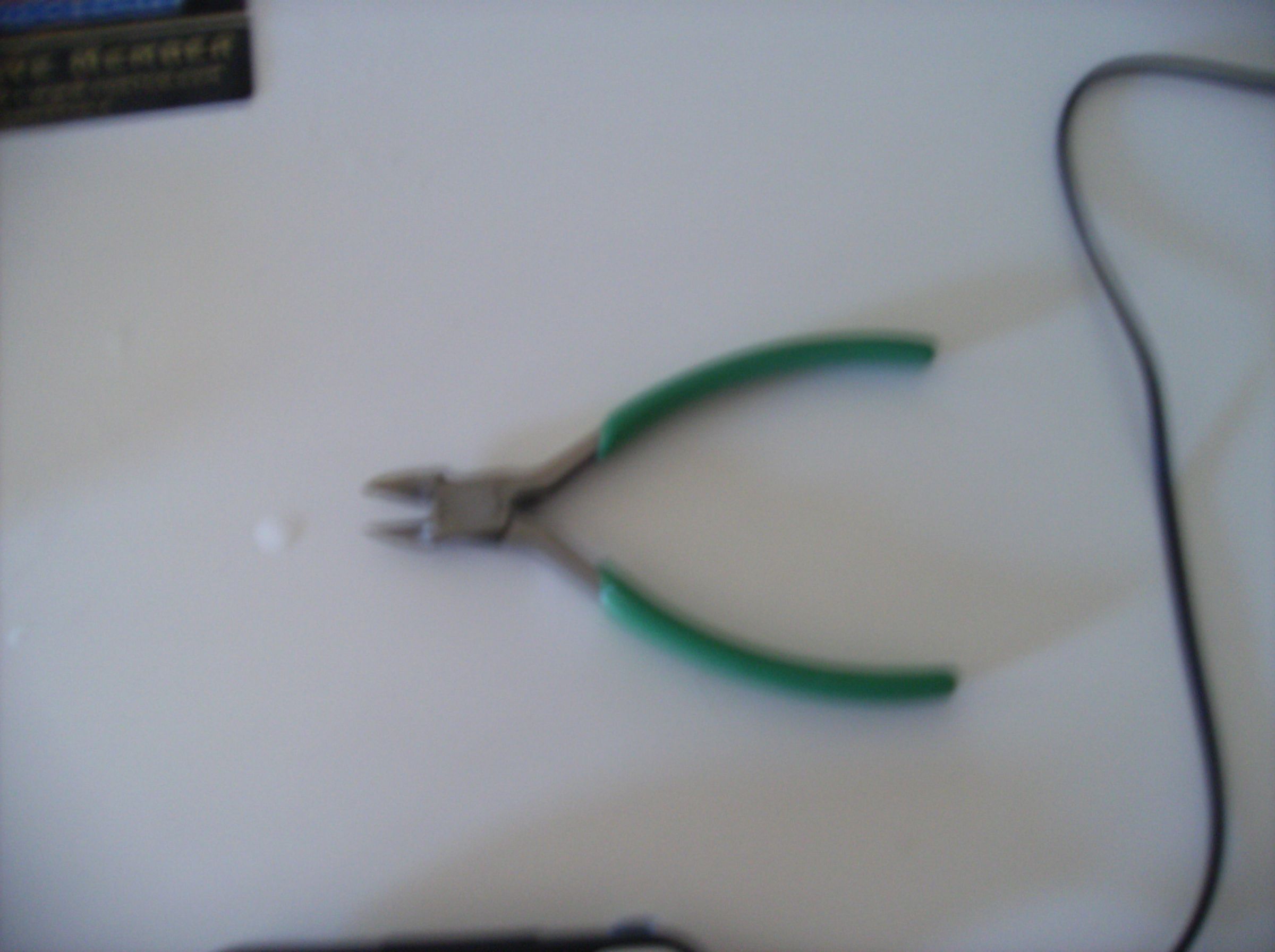 Earbud Cord Wrapper Improvement 4 Steps Instructables