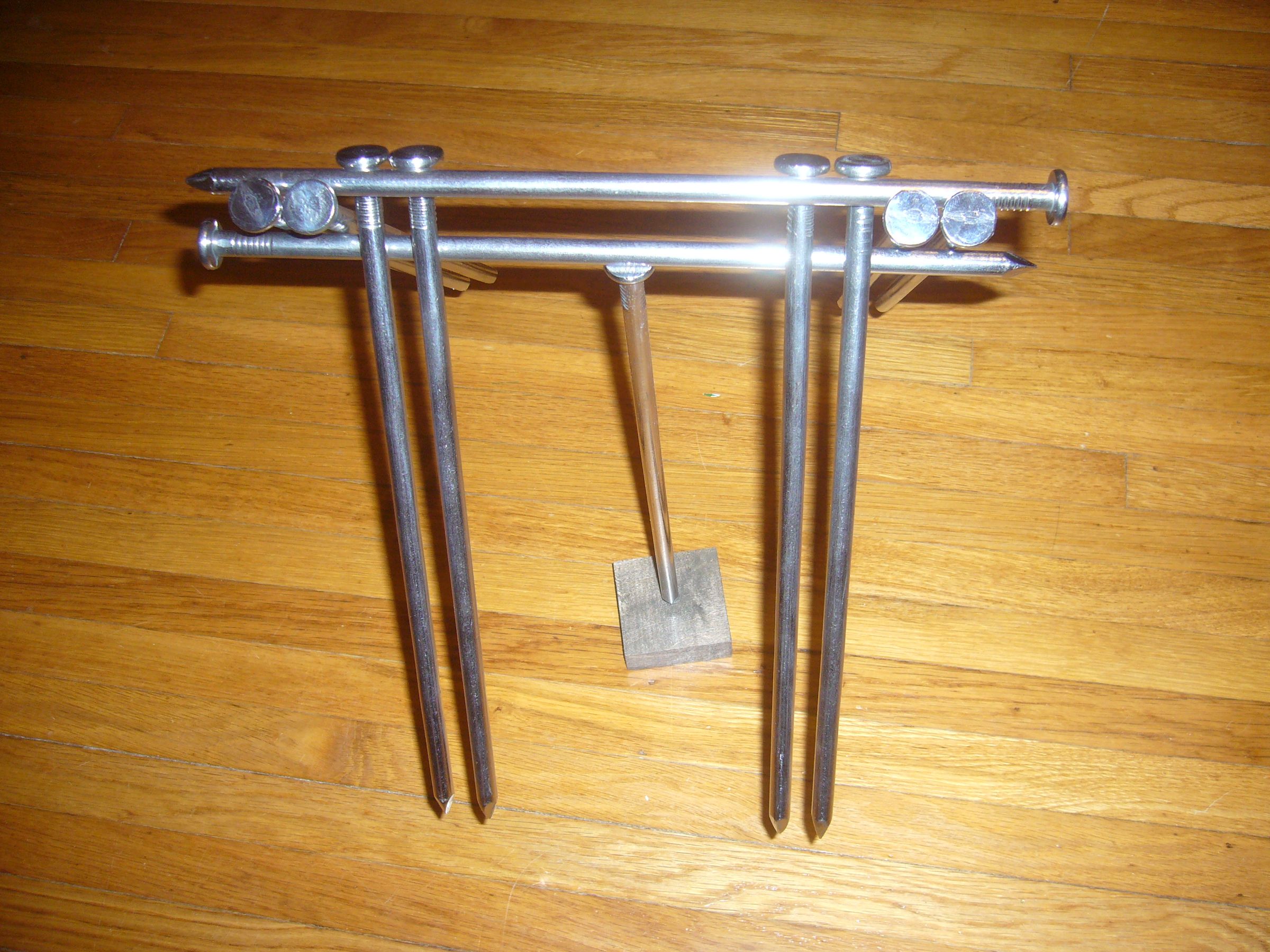 Balance 10 nails on one nail