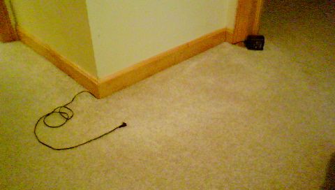 How to Hide Any Wire Along a Carpeted Wall