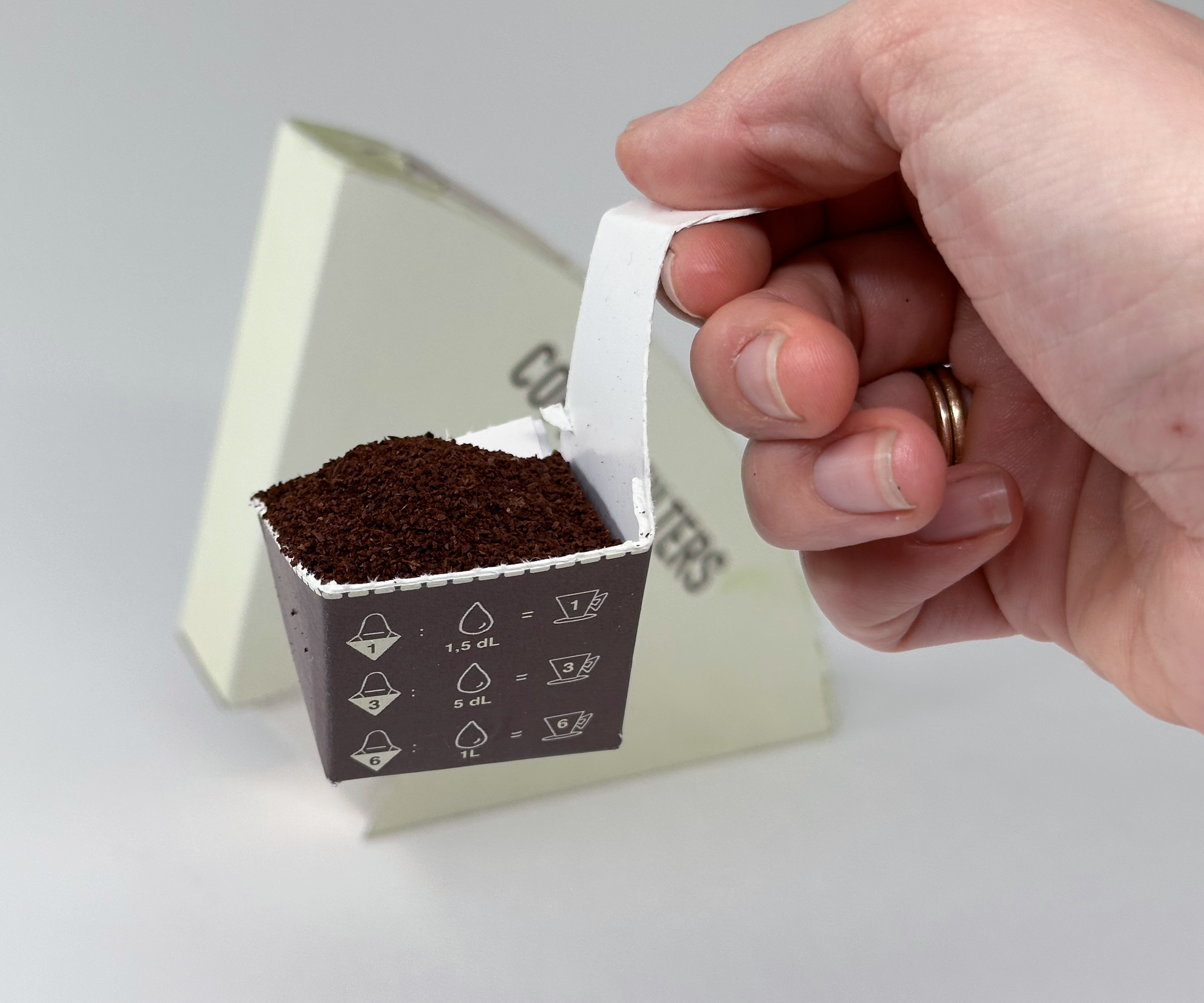 FilTear - a Coffee Filter Box With a Tear Off Measuring Cup