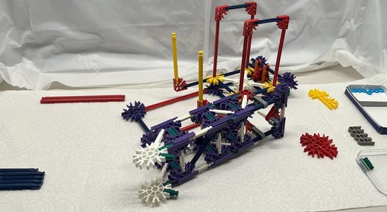 Place the Upper Arm Assembly