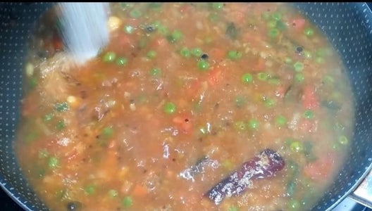 Adding Water Cooking and Serving Khara Bath. 