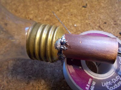 Glue the Light Bulbs to the Copper Pipes