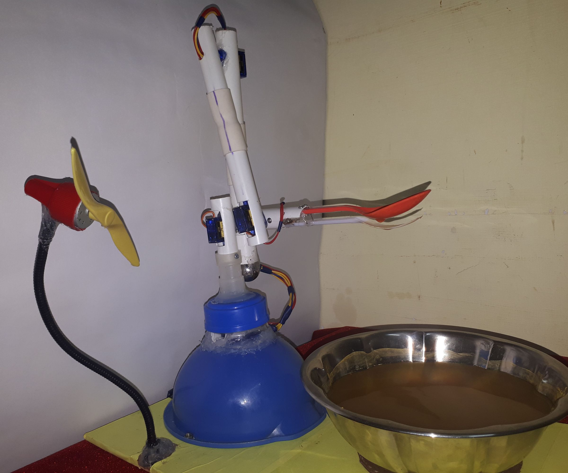 Intelligent Feeding Arm for Humans - Not Only for Lazy
