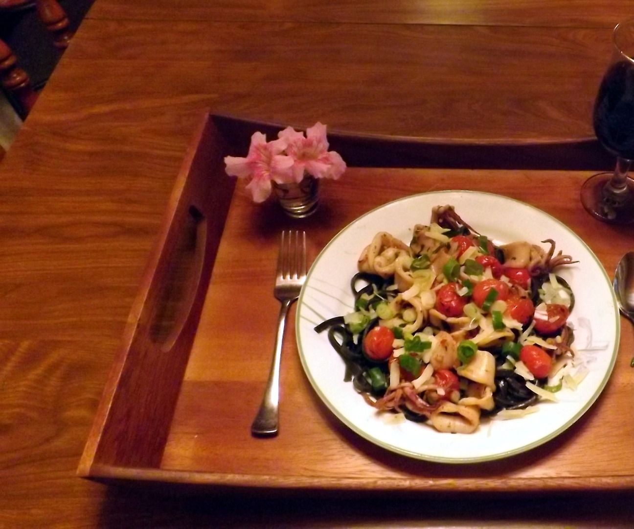 BLACK SQUID INK LINGUINE WITH FRESH CALIMARI & SWEET RED GRAPE TOMATOES