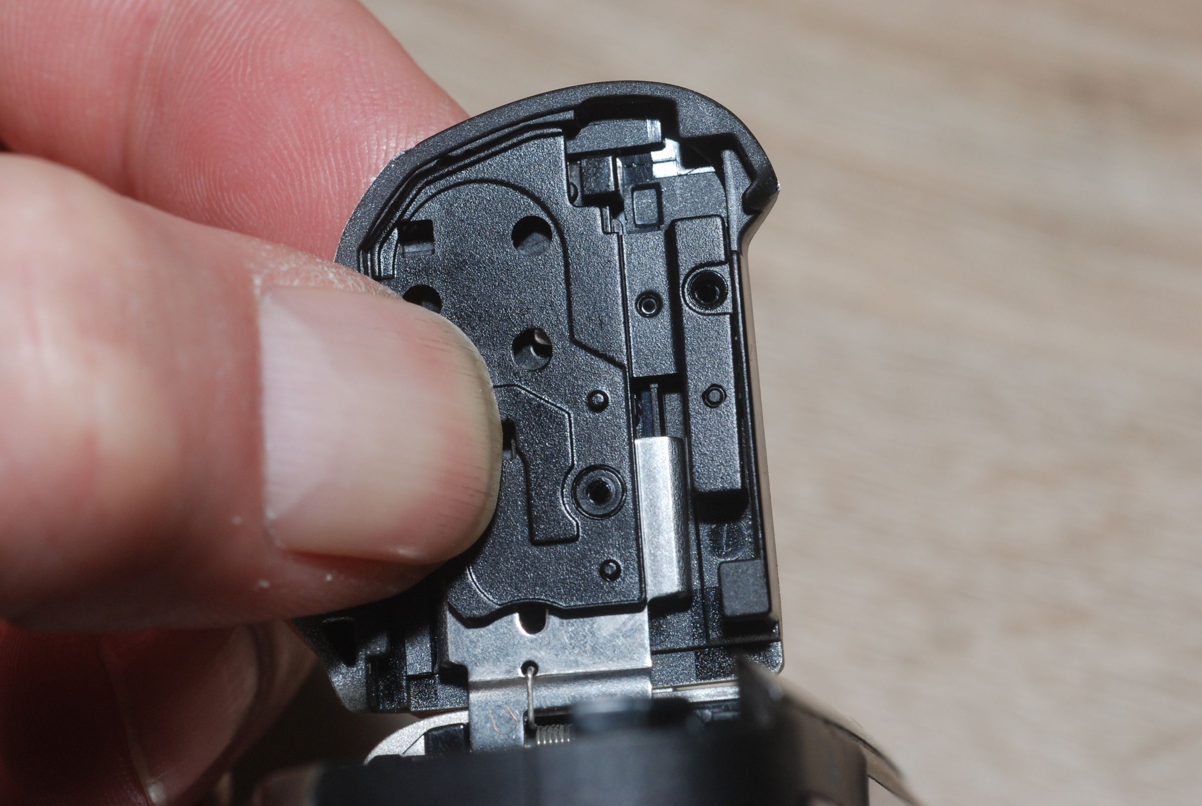 Replacement of Canon PowerShot SX130IS Battery Compartment Door 4