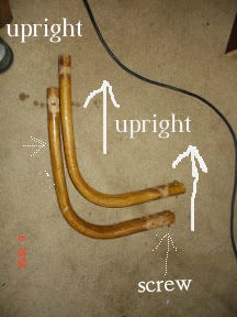 Making the Arms Out-rollers for Holding Long Boards Flat on the Saw .