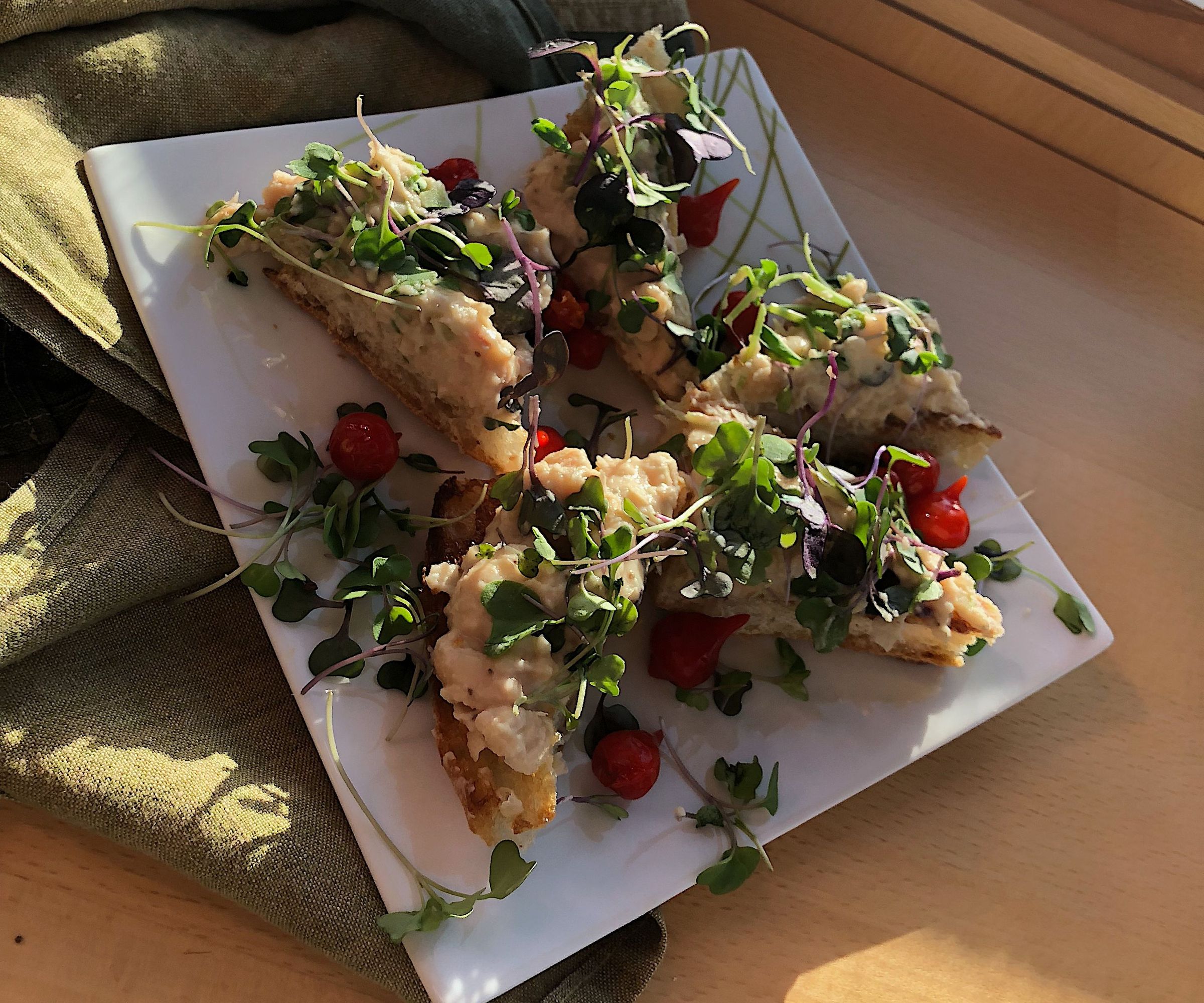 White Bean Tartines With Herbs and Microgreens