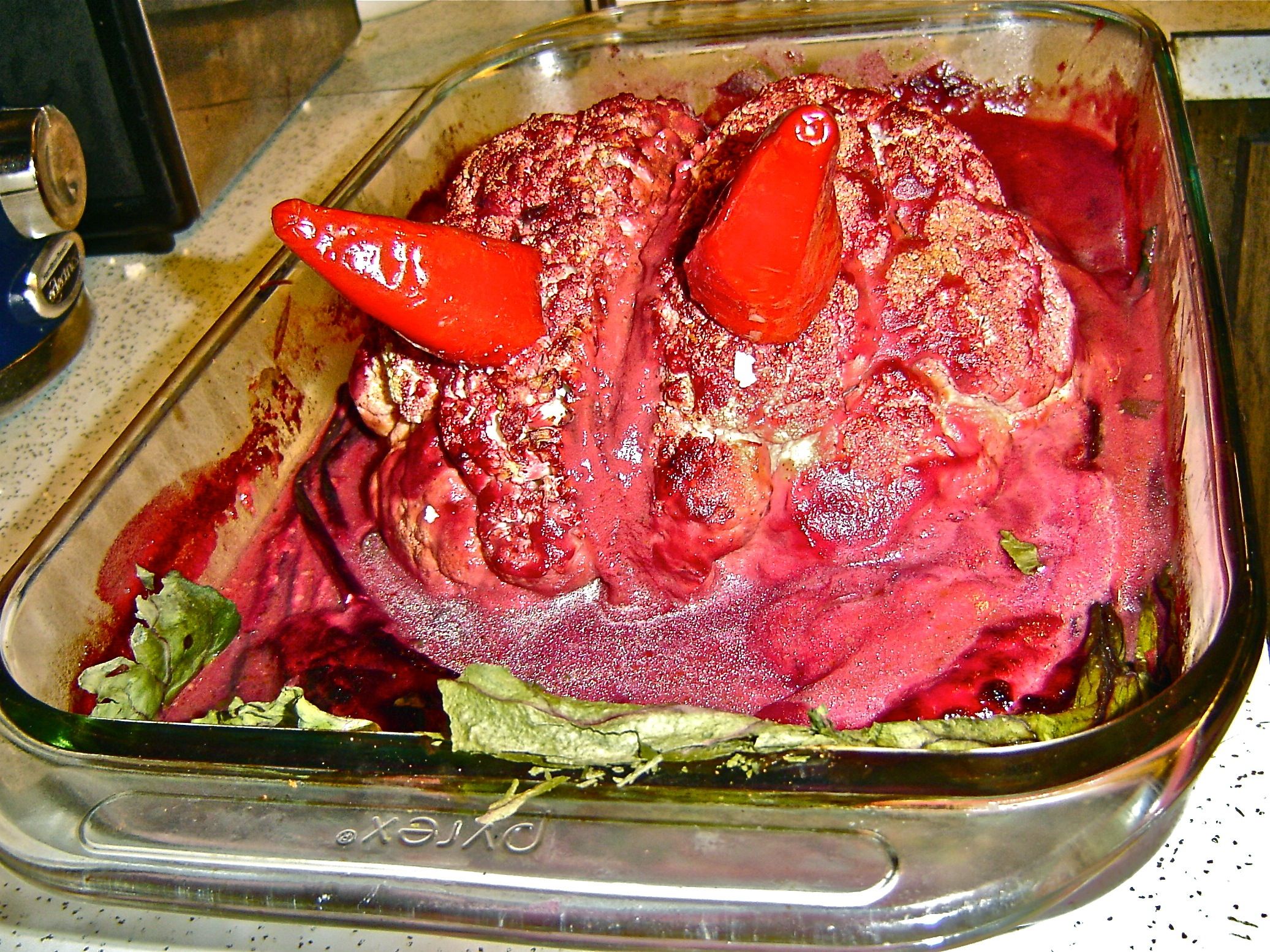 Baked Devil's Brain in Blood Sauce