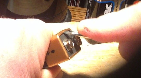 How to Pry Open a 9 Volt for Parts