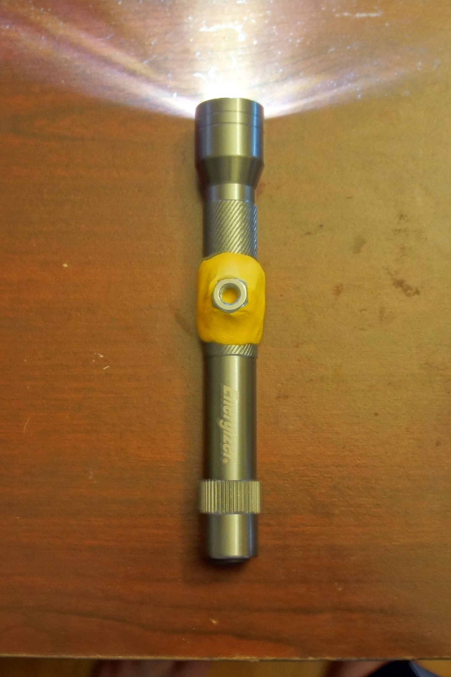 Making an adjustable Flashlight stand with Sugru