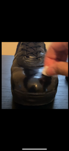 Put Polish on Boot Using Cotton Ball