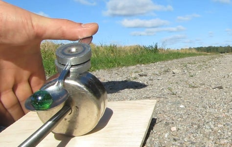 Place the Smaller Magnets and Spoon on a 90 Degree Angle Over the Big Magnet