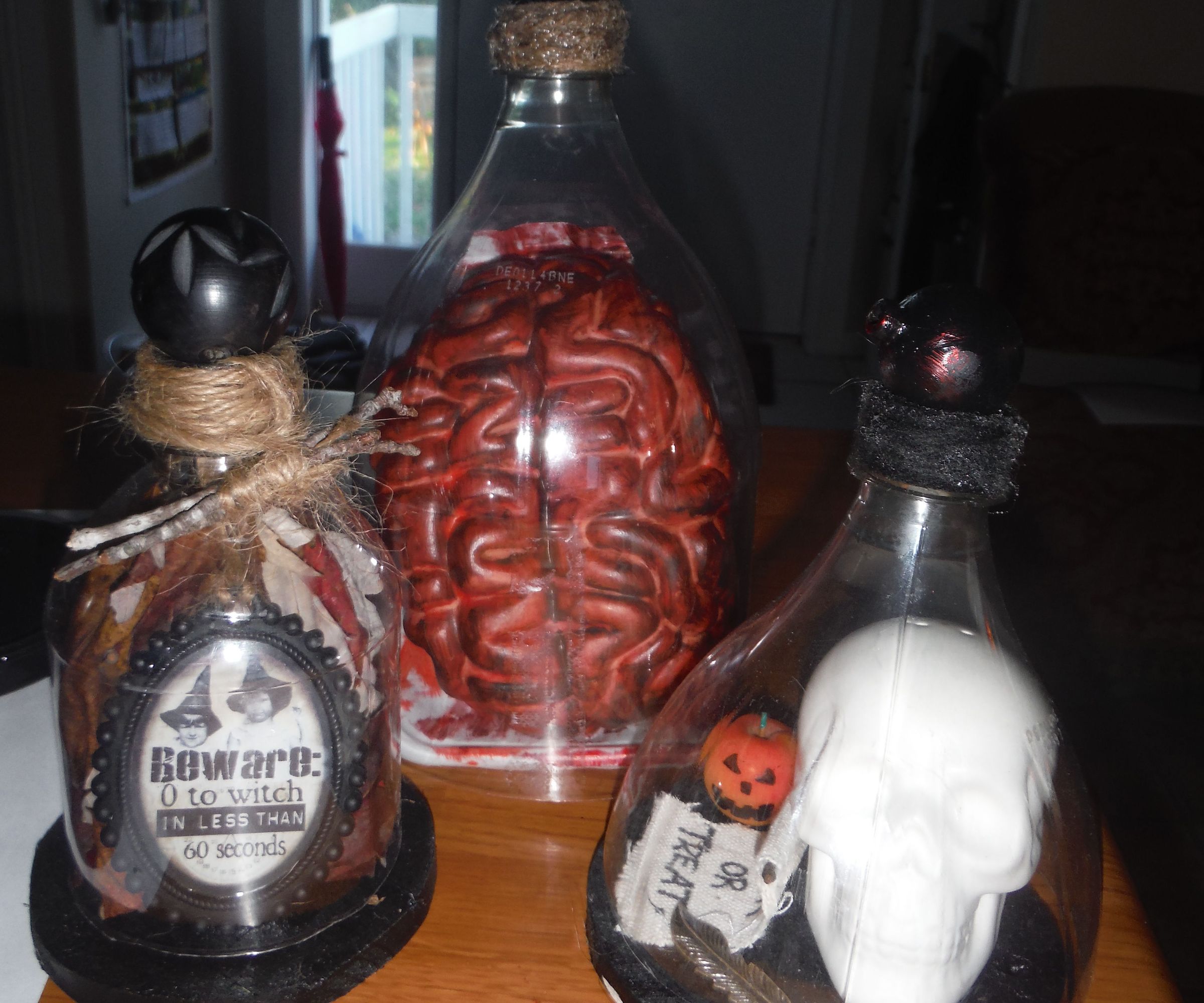 Macabre Bell Jars From Recycled Pop Bottles