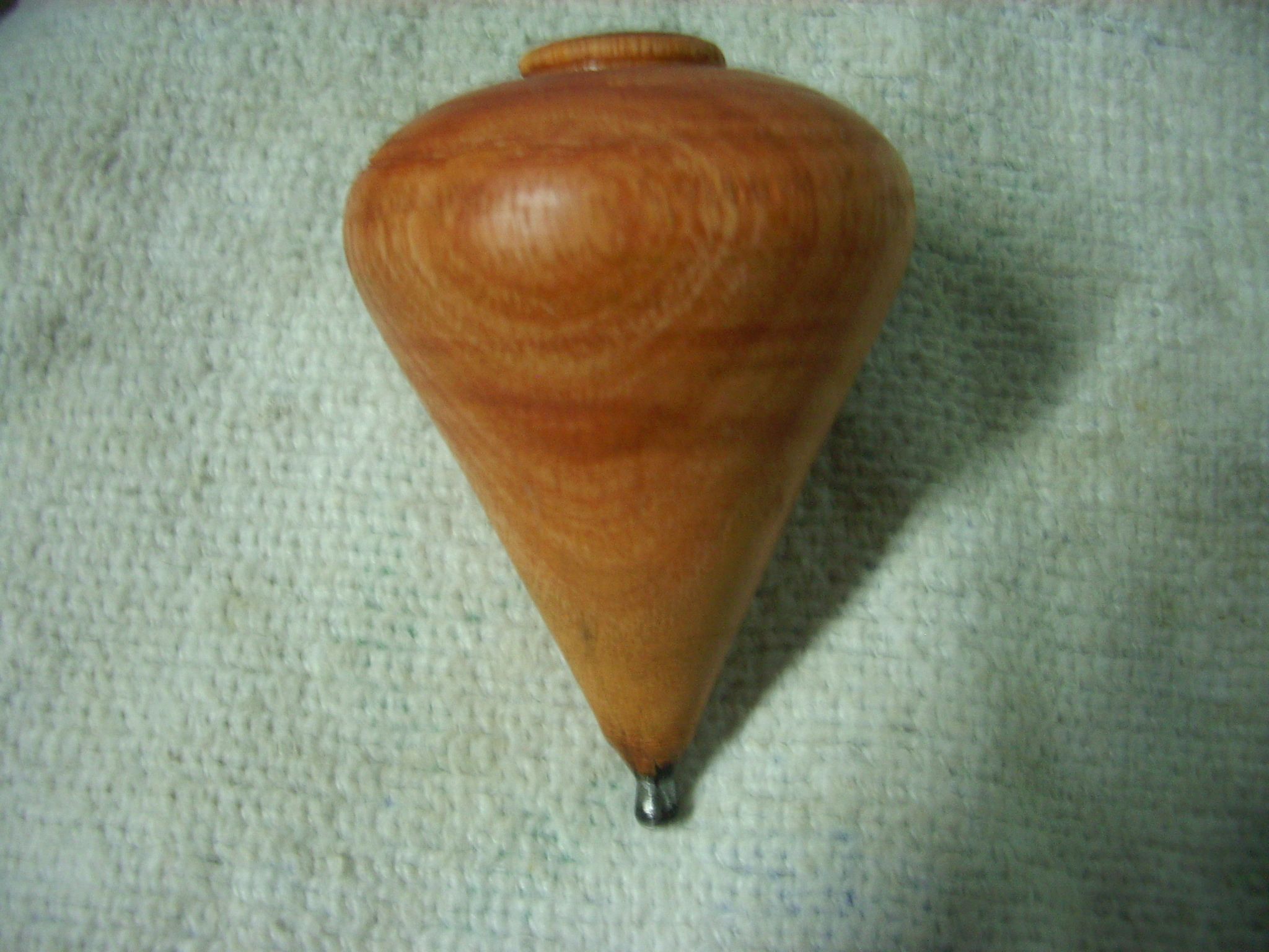 Torneando Un Trompo (turning a Top)