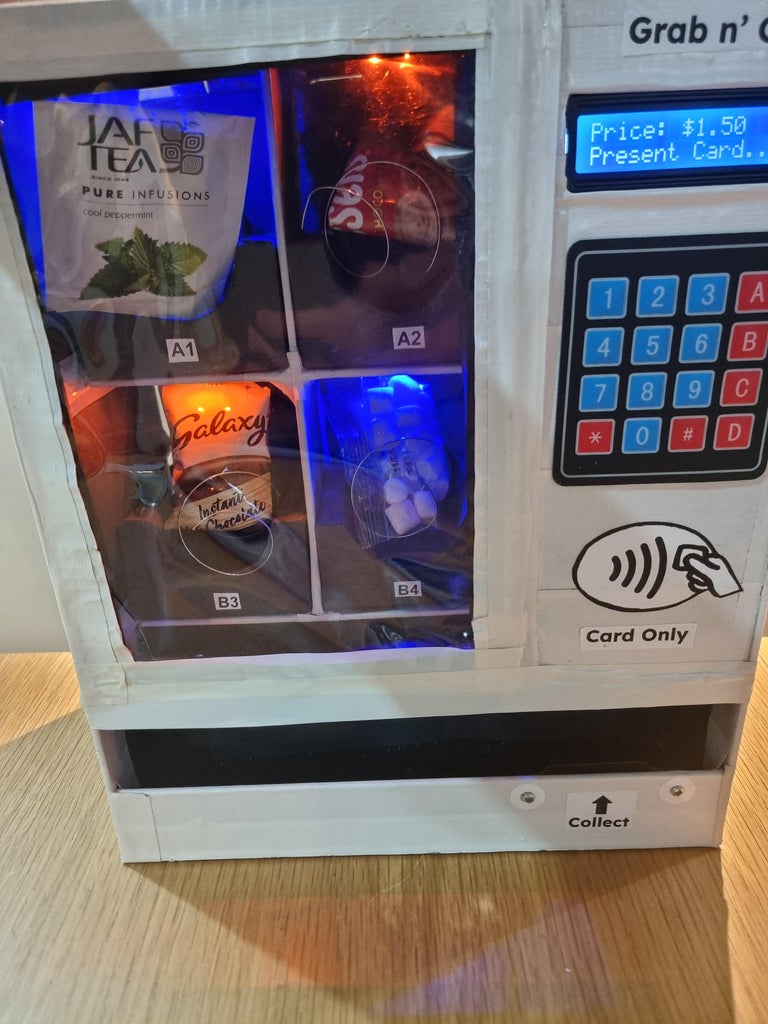 Craft Your Own Desktop-Sized Cardboard Vending Machine With an Arduino ...