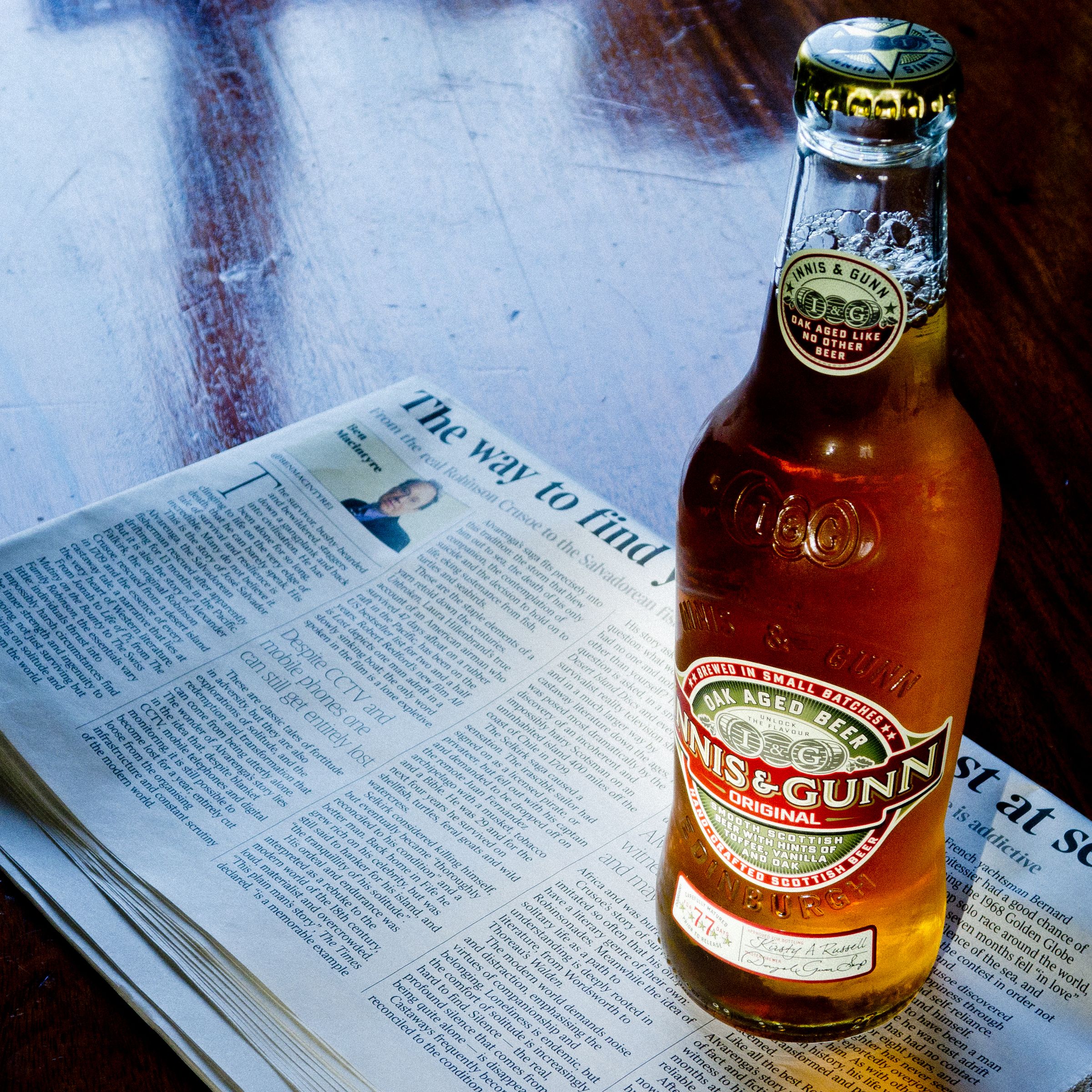 How to Open a Beer Bottle With a Newspaper