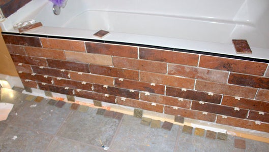 Finish Bottom Row and Grout.